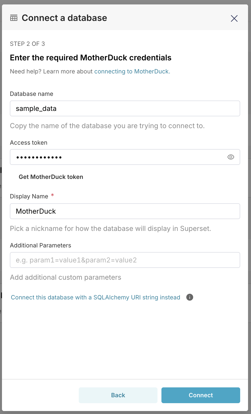 Superset MotherDuck connection form with database name and token fields